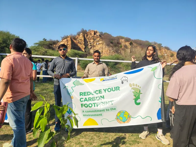 Students taking part in an environmental learning session outdoors